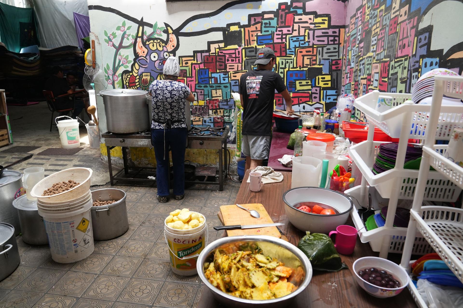 At Nuevo Peru's headquarters in Lima, volunteers cook meals for hundreds of protesters who have come from Peru's southern highlands.