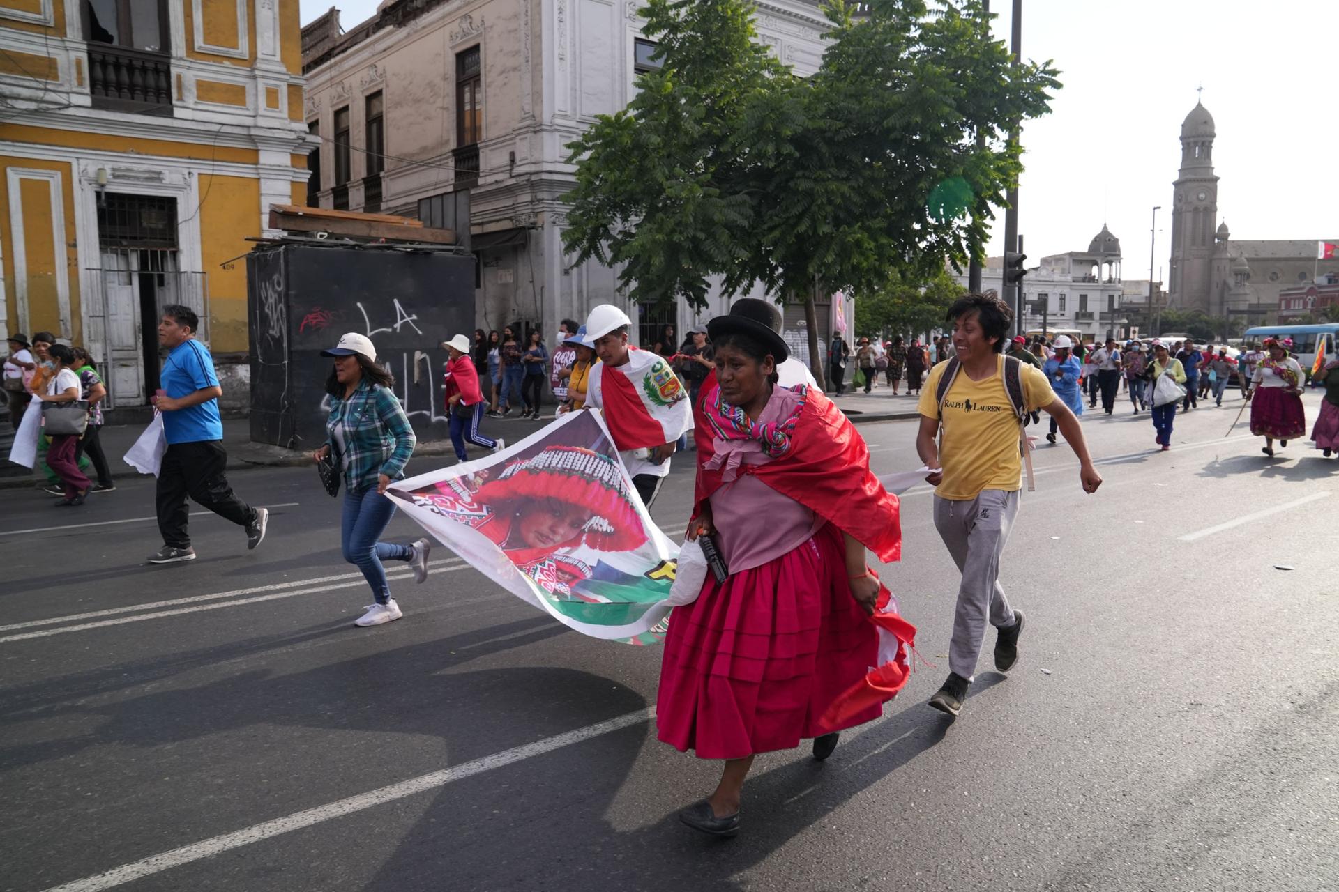 Indigenous activists runs through the streets of Lima, during a recent protests against Dina Boluarte's government. 