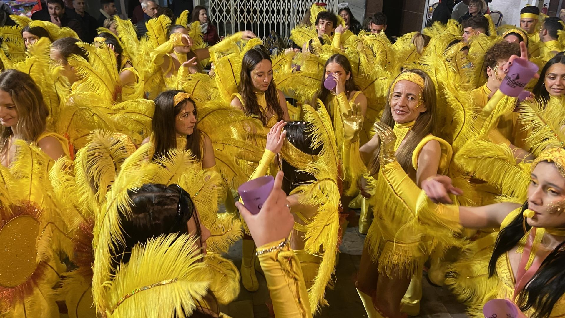 women in yellow