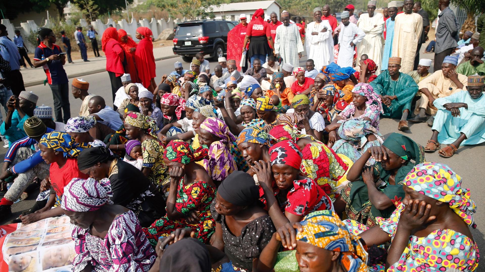 Some of the Chibok schoolgirl's parents protest in Abuja, Nigeria, in January 2016, nearly two years since the abduction of their daughters by Boko Haram militiamen.