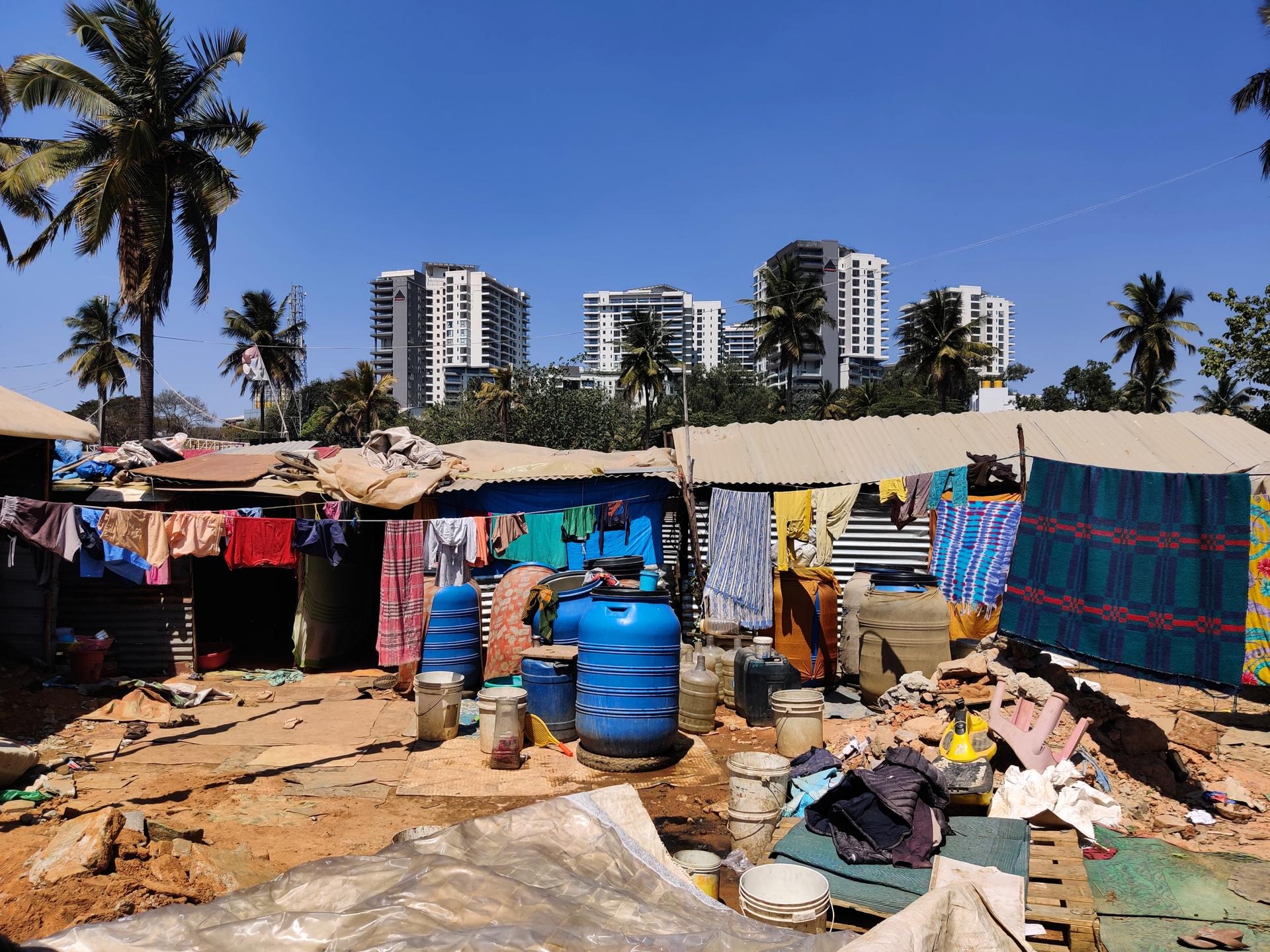 High-rises seen from a waste pickers colony in north Bangalore, India.