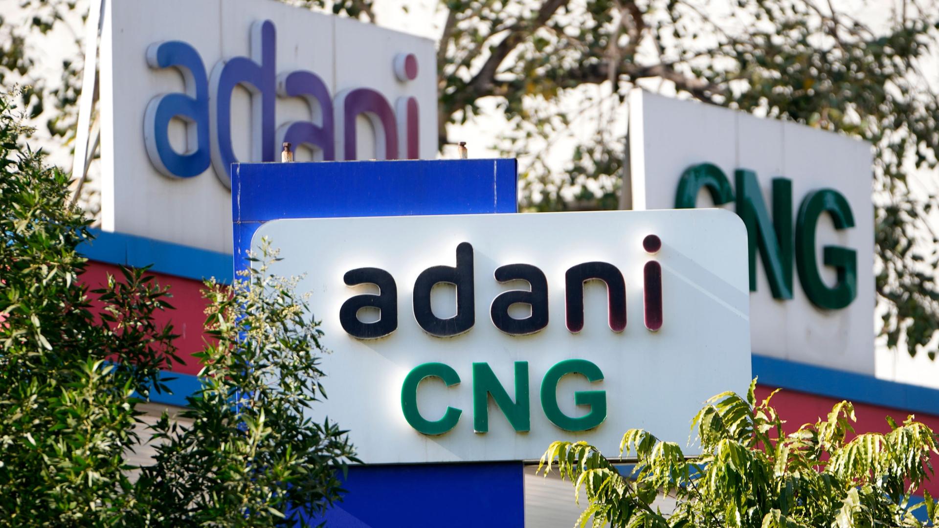 Signage of Adani's compressed natural gas station are displayed at company's outlet in Ahmedabad, India, Feb. 2, 2023. 
