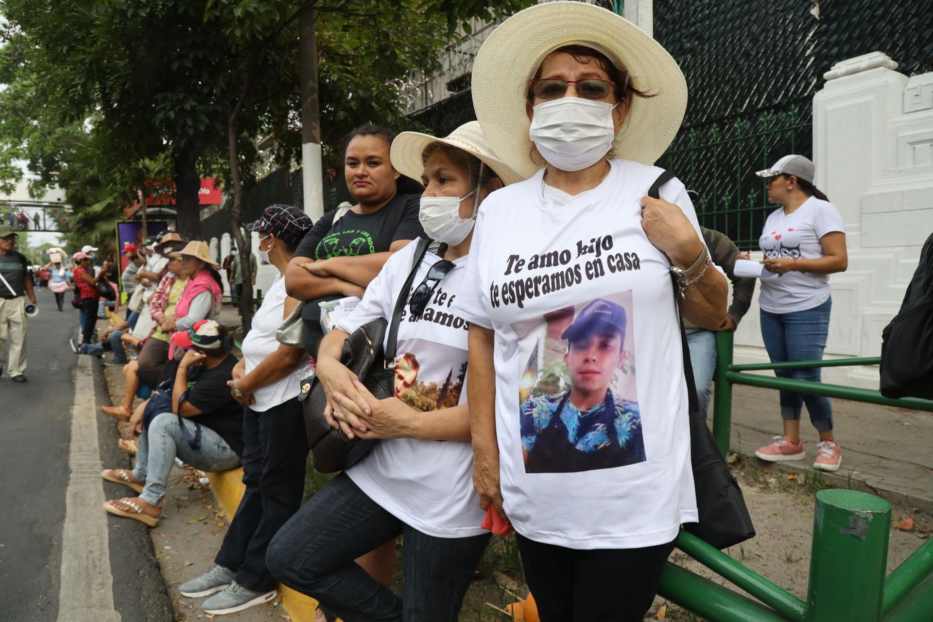 A mother of a detained son marches on May 1, in San Salvador. 