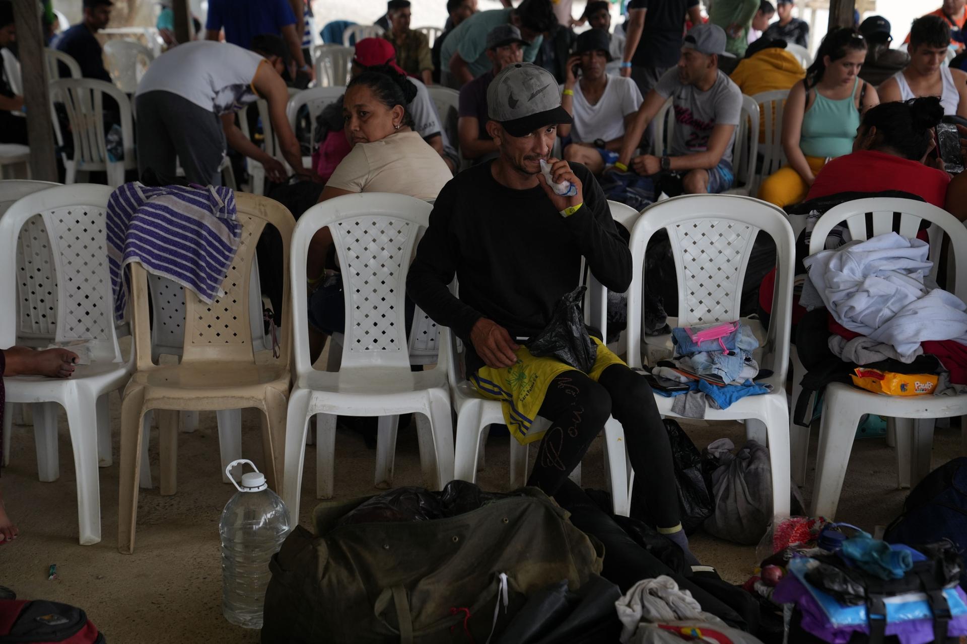 A Venezuelan migrant takes a break at a shelter in Capurgana, Colombia before starting the trek across the Darien Gap. 