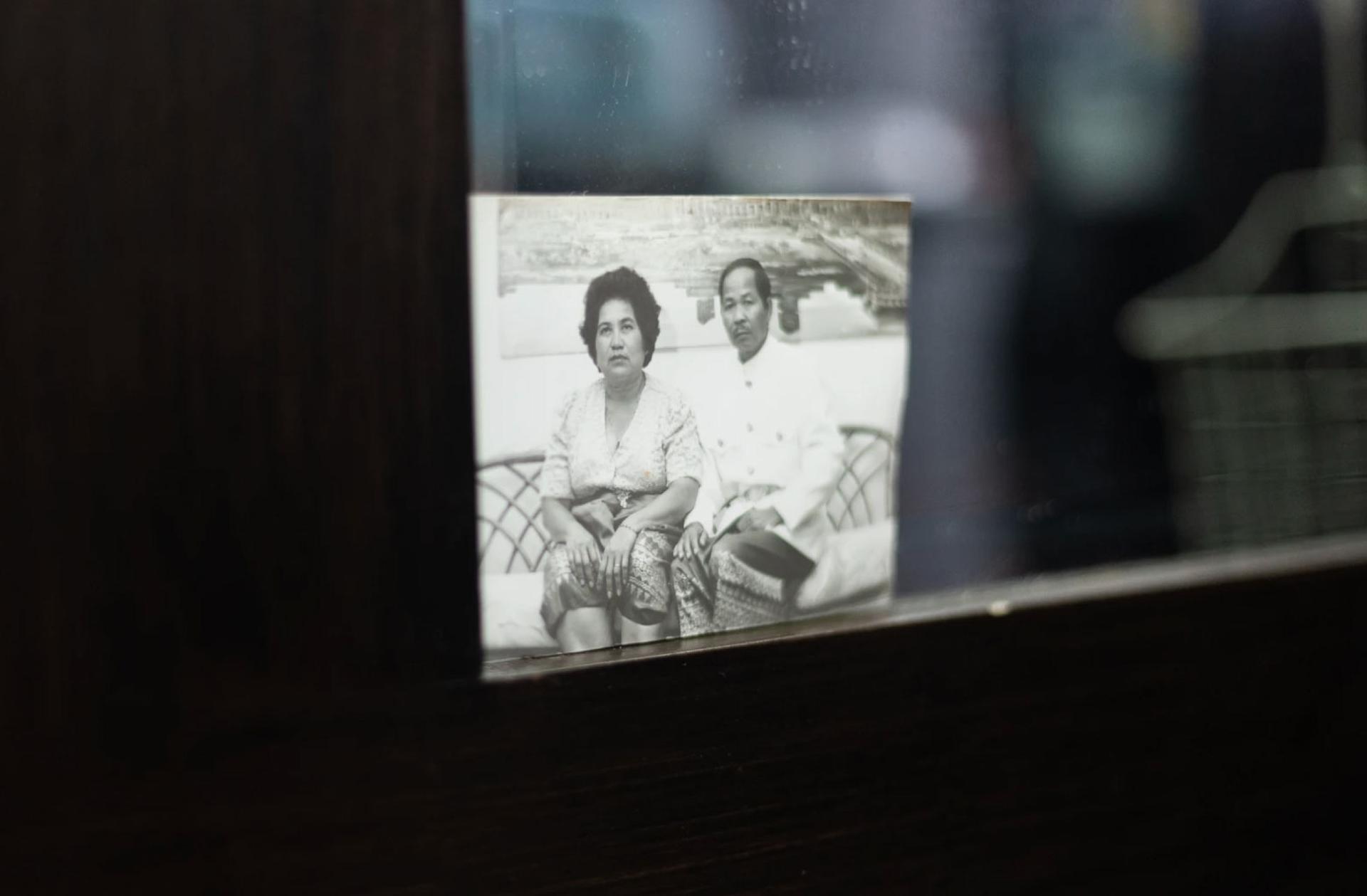 A picture of Ariya Tok's paternal grandparents is tucked into the mirror at her mothers station.
