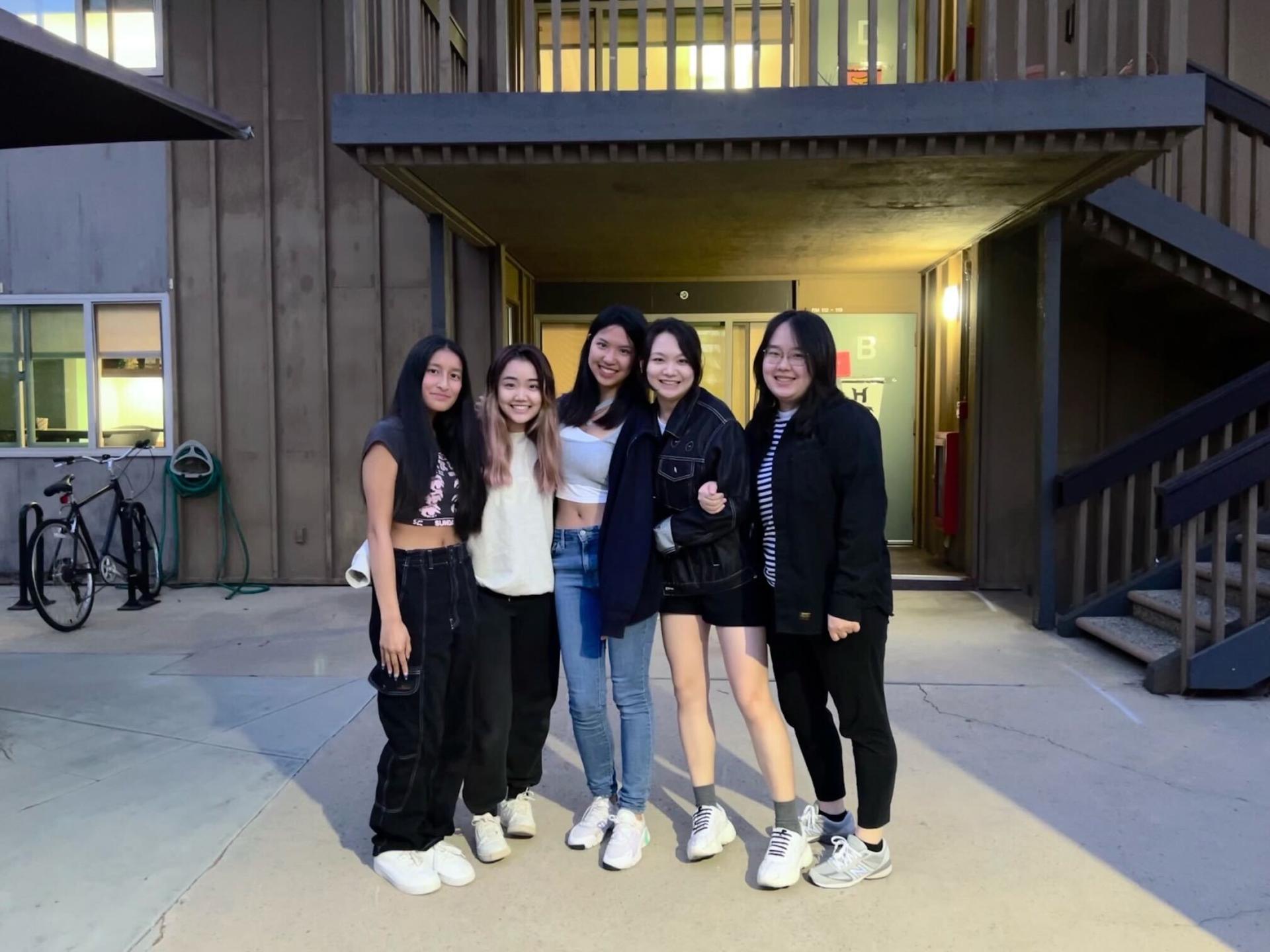 Tianrui Huang (center) with her friends at UC San Diego, June 2022.