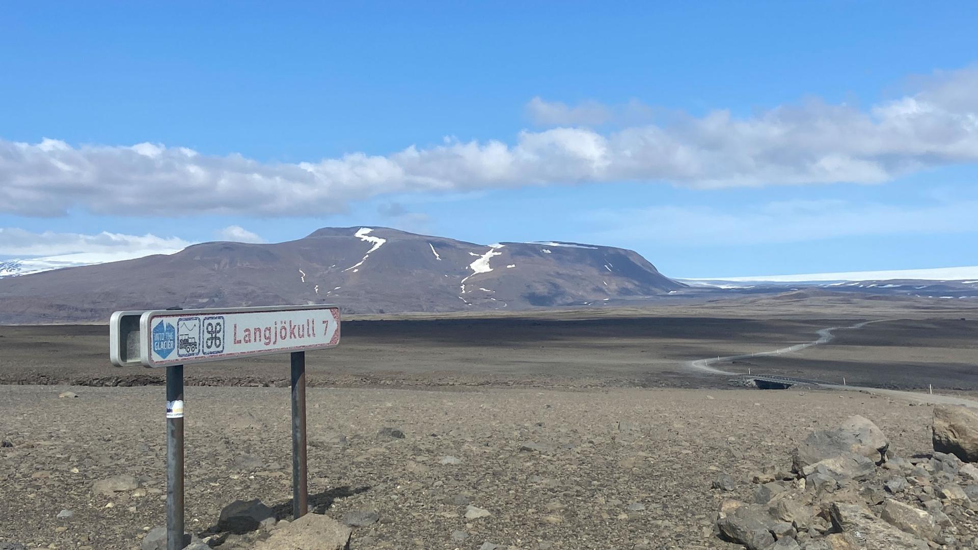 Langjökull looms like a white wave over Iceland’s volcanic landscape.