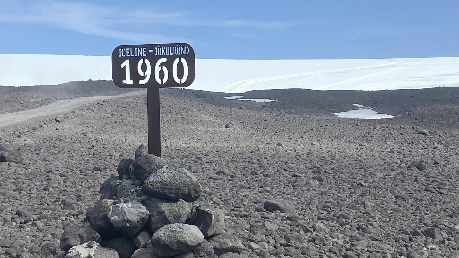 A series of signs marking where the Langjökull glacier once stood form a timeline of loss, as the ice retreats due to global warming.