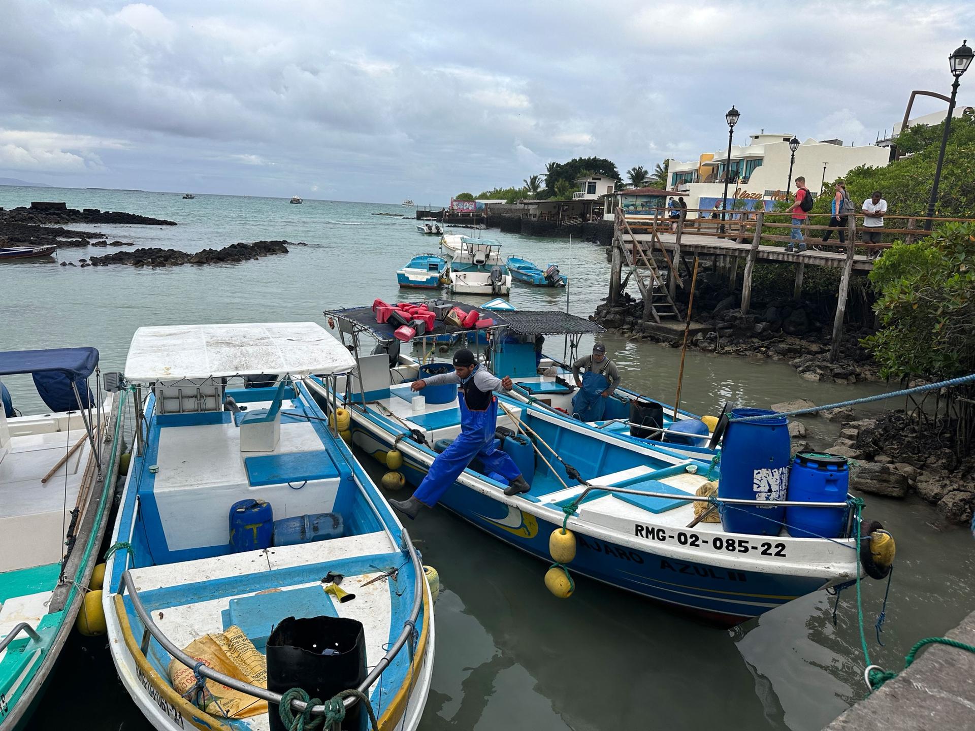 Fishing boats return to port in Puerta Ayora in the Galapagos town of Puerta Ayora. 