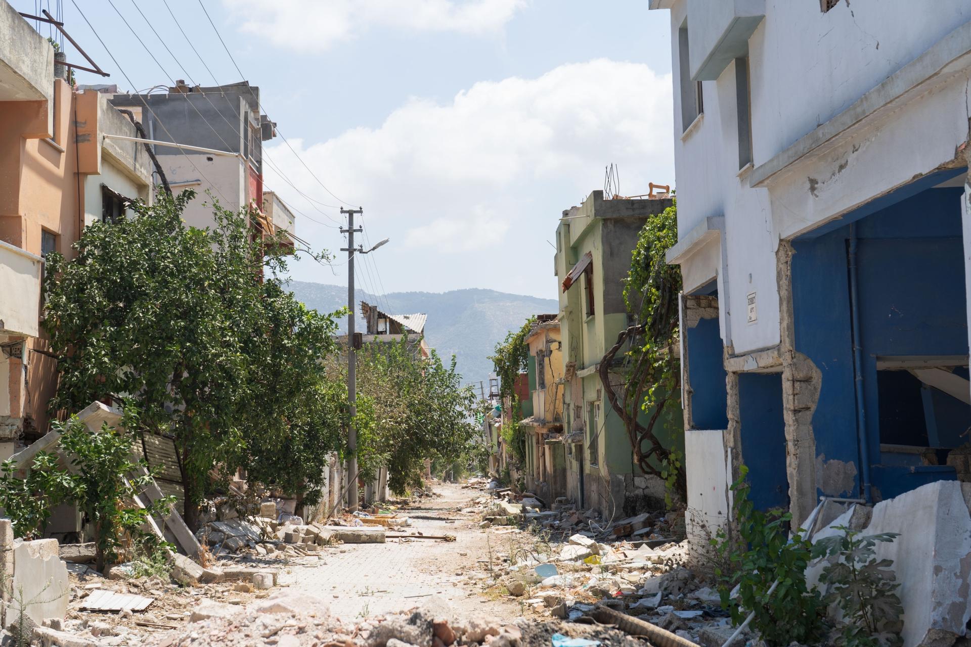 Some homes and buildings remain standing in central Antakya, Turkey, awaiting demolition.