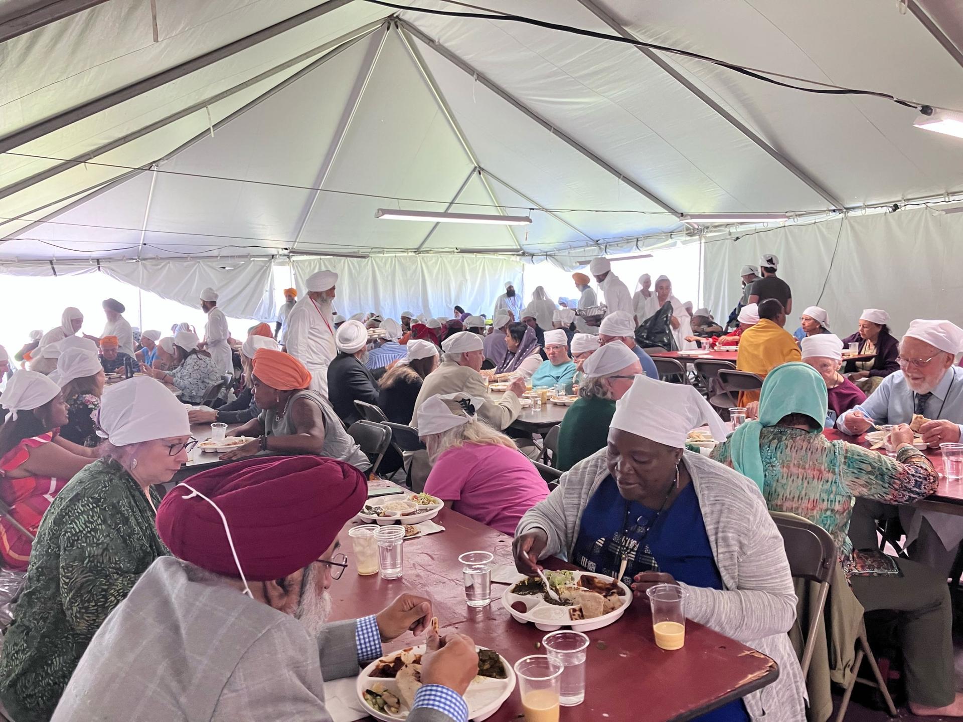 Participants enjoy langar, a free communal lunch provided by Sikhs, which they consider a devotional service.