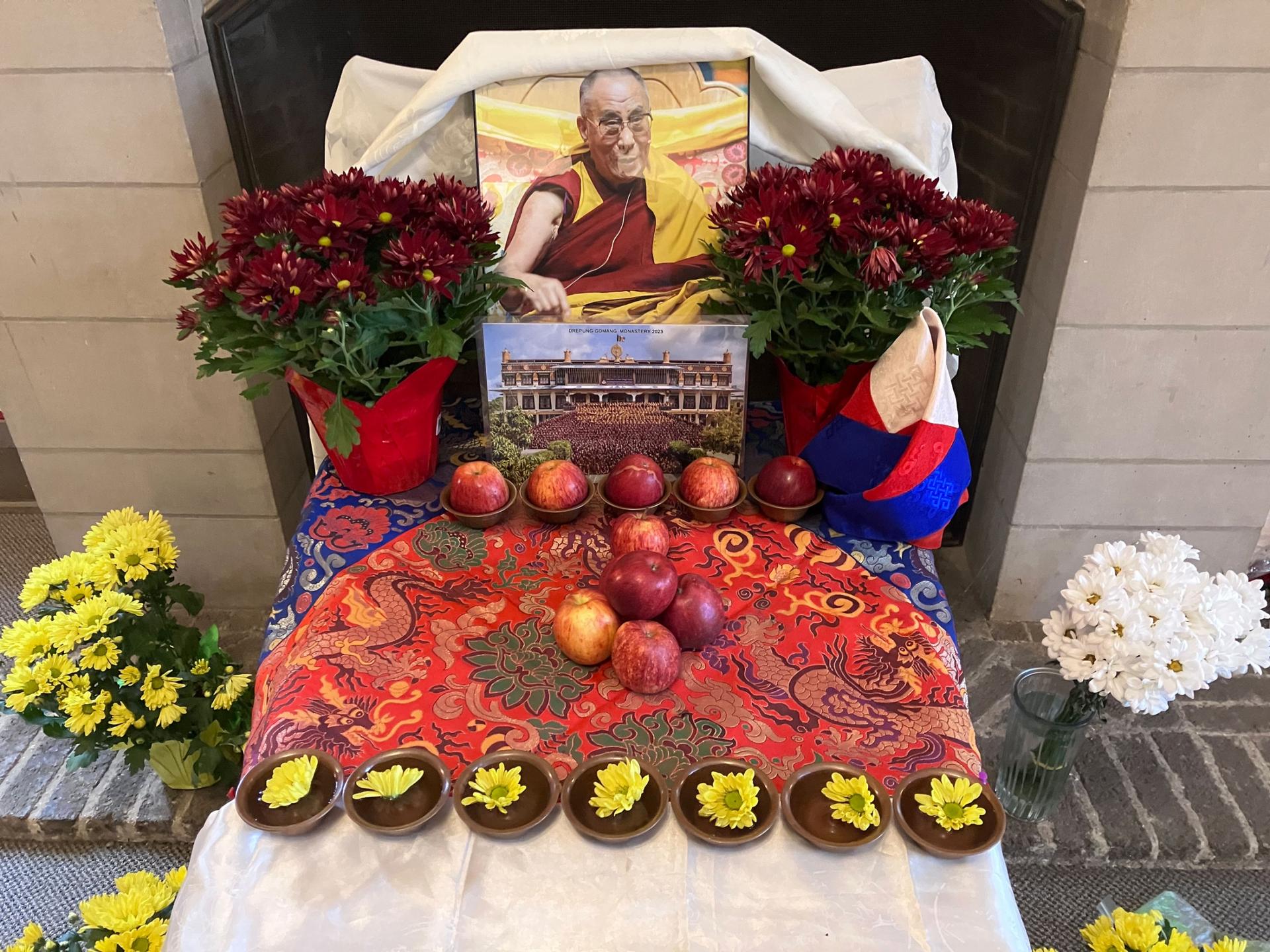 A shrine to the 14th Dalai Lama is set up in the room at Lake Street Church, where the monks are in residence for a week. 