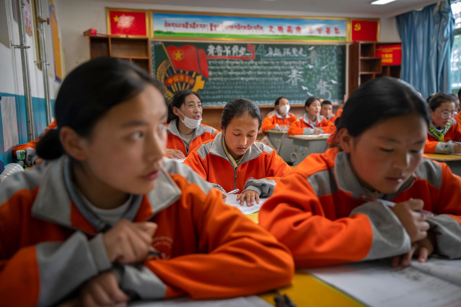 Students recite vocabulary during a Mandarin Chinese class at Nagqu No. 2 Senior High School, a public boarding school for students from northern Tibet, in Lhasa in western China's Tibet Autonomous Region, as seen during a rare government-led tour of the 