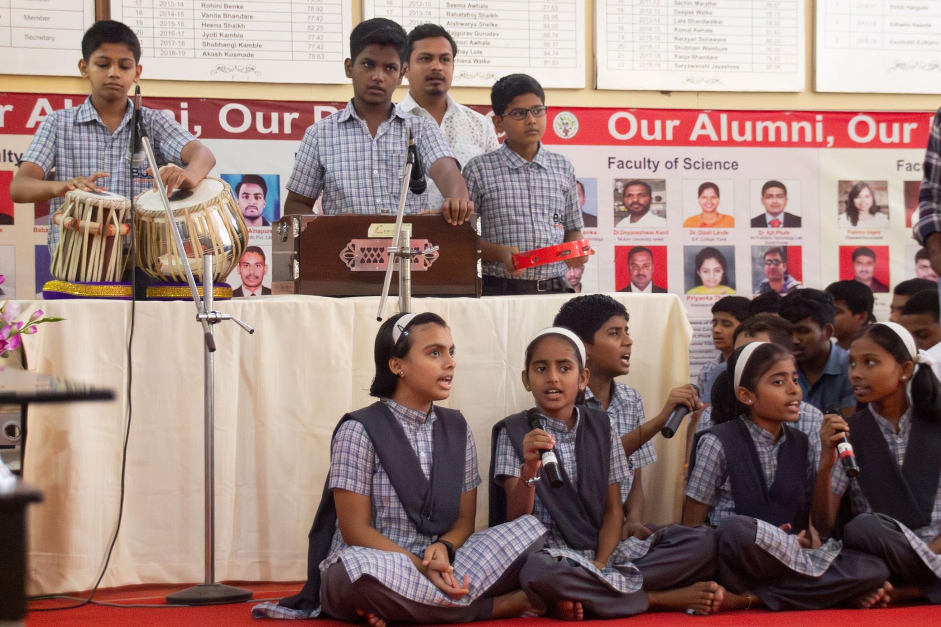 BJS students perform a song prepared for the founder, Shantilal Muttha, during his recent visit on campus.