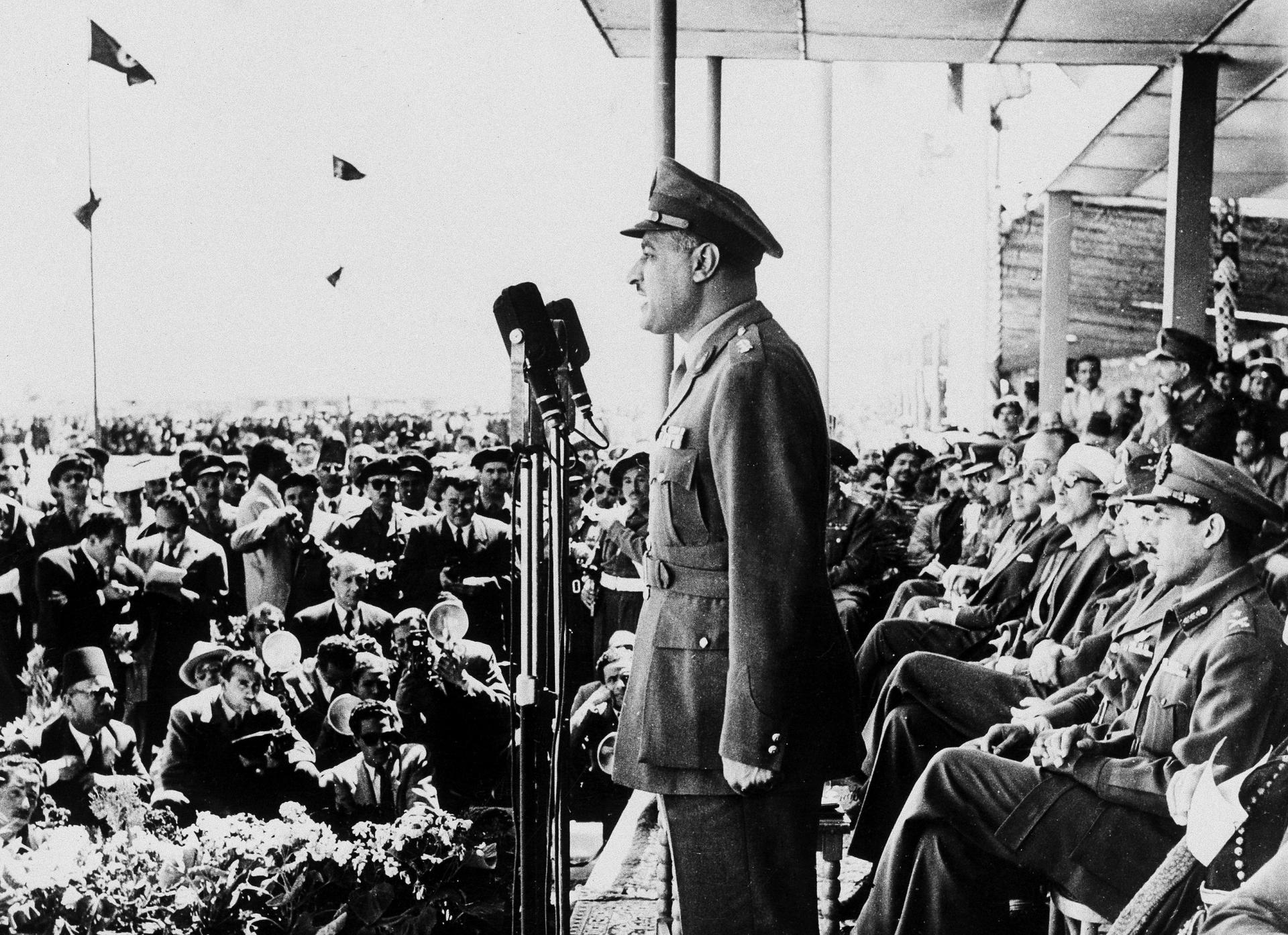 Egyptian President Gamal Abdel Nasser addresses troops on parade during ceremonies to raise the Egyptian flag over Camp Shalupa in the Suez Canal Zone, March 22, 1955.