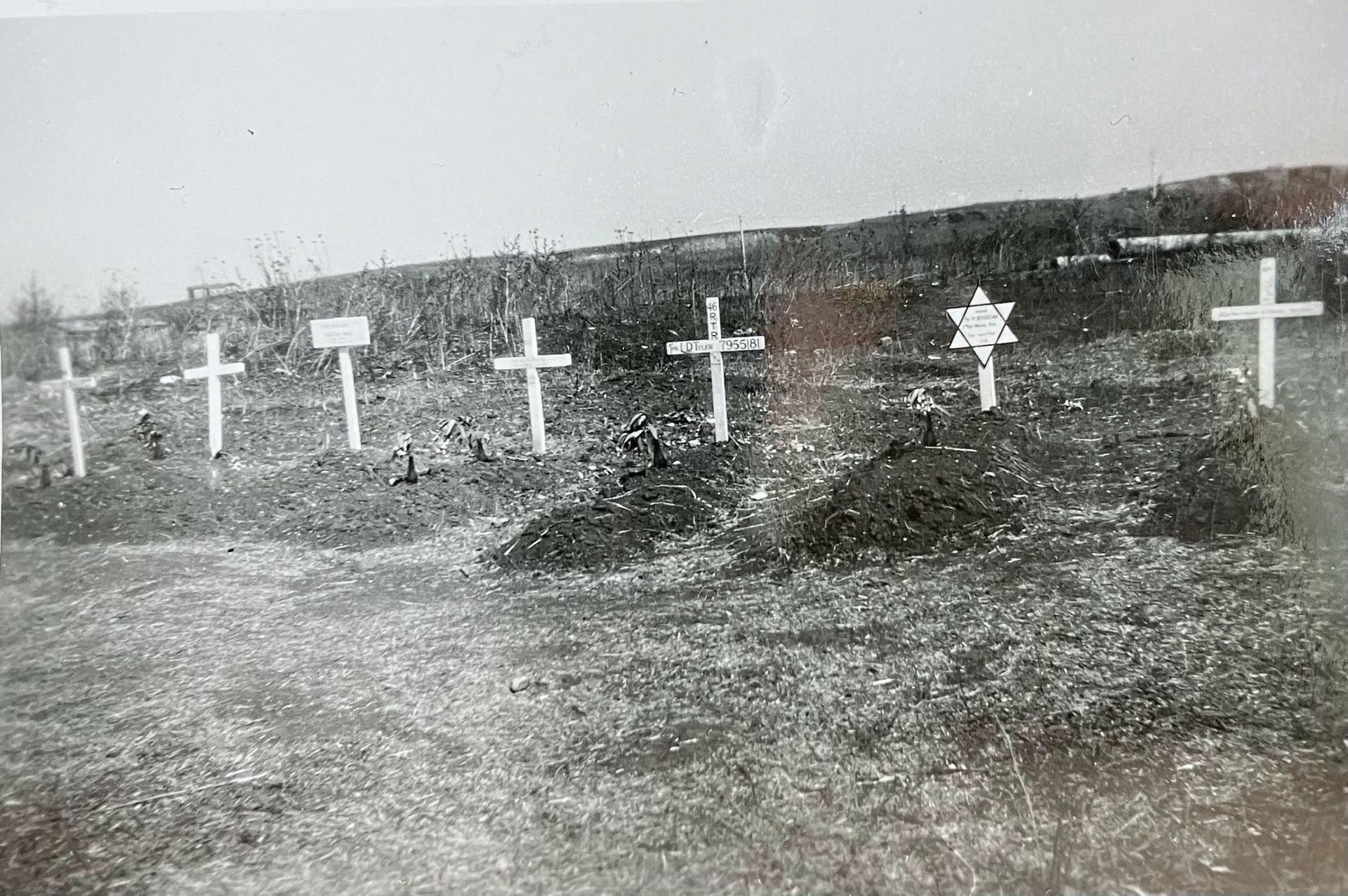 A cemetery for fallen soldiers with religious markers at each grave in southern Italy, date unknown.