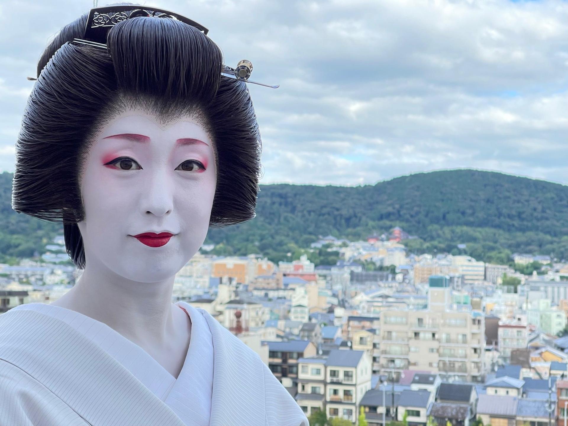 A Japanese woman dressed as a geisha