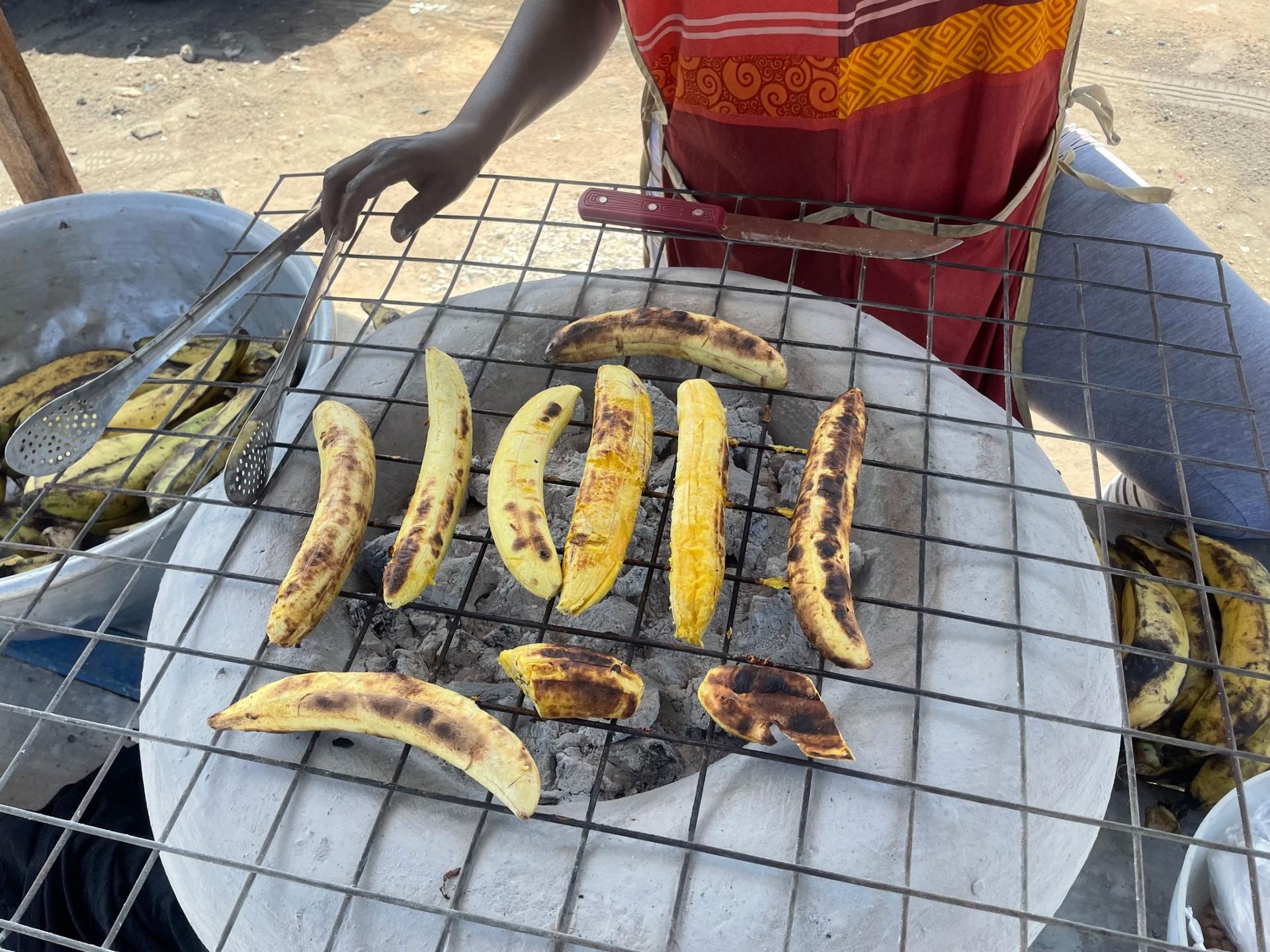 Rose Eshun, a  food-seller who sings to attract buyers for her boiled corn and roasted plantain has been using firewood and charcoal laced with kerosene for years to boil her corn.