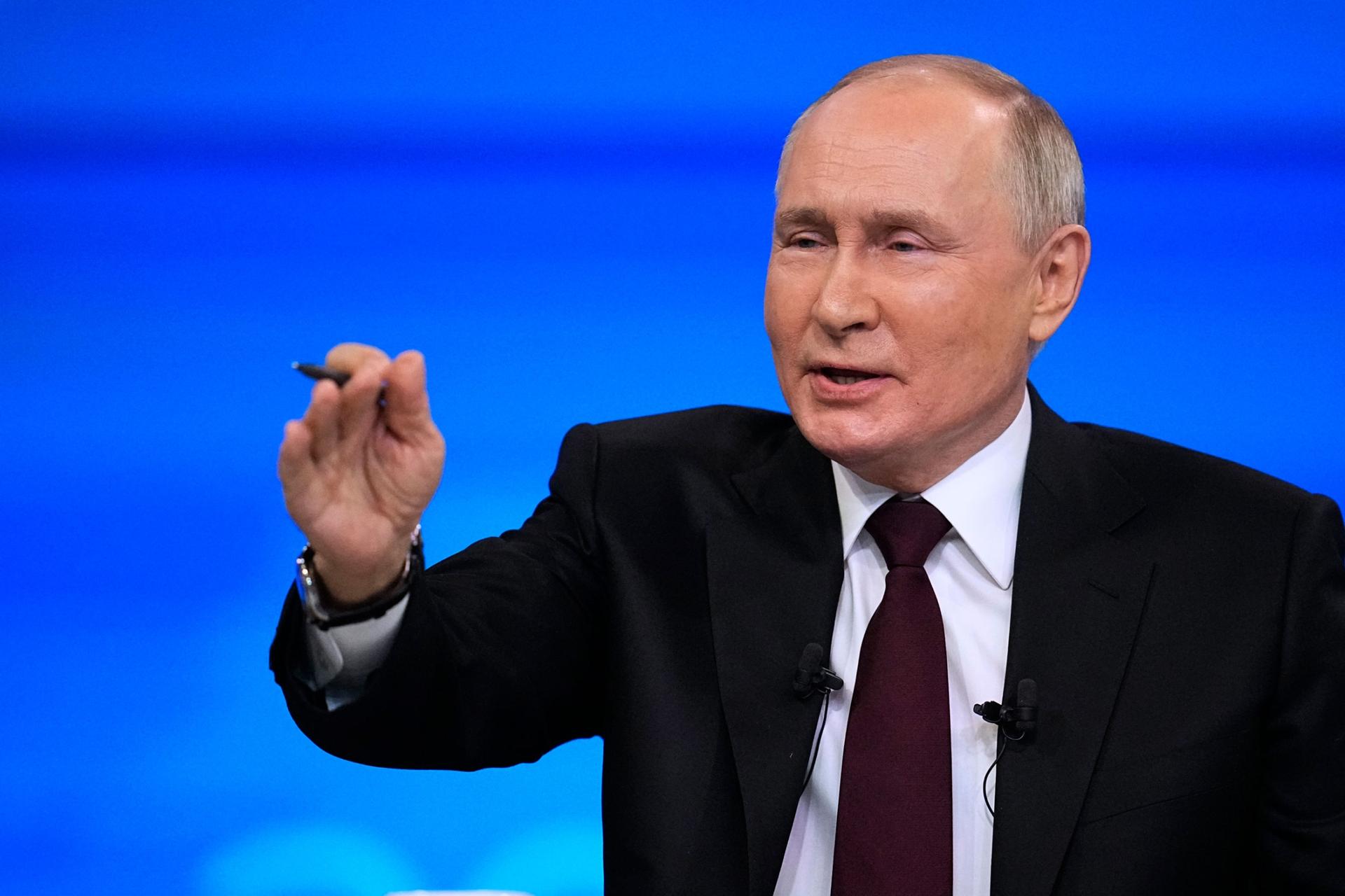 Russian President Vladimir Putin gestures during his annual news conference in Moscow, Russia, Thursday, Dec. 14, 2023.