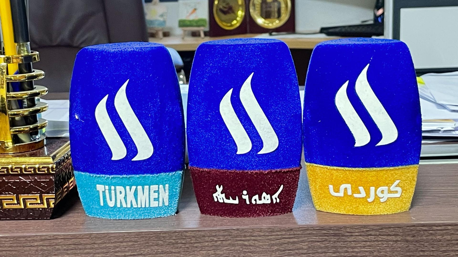 Microphones representing the different sister station languages at Al-Iraqiya media network, with Syriac in the center, Baghdad, Iraq, Aug. 27, 2023.