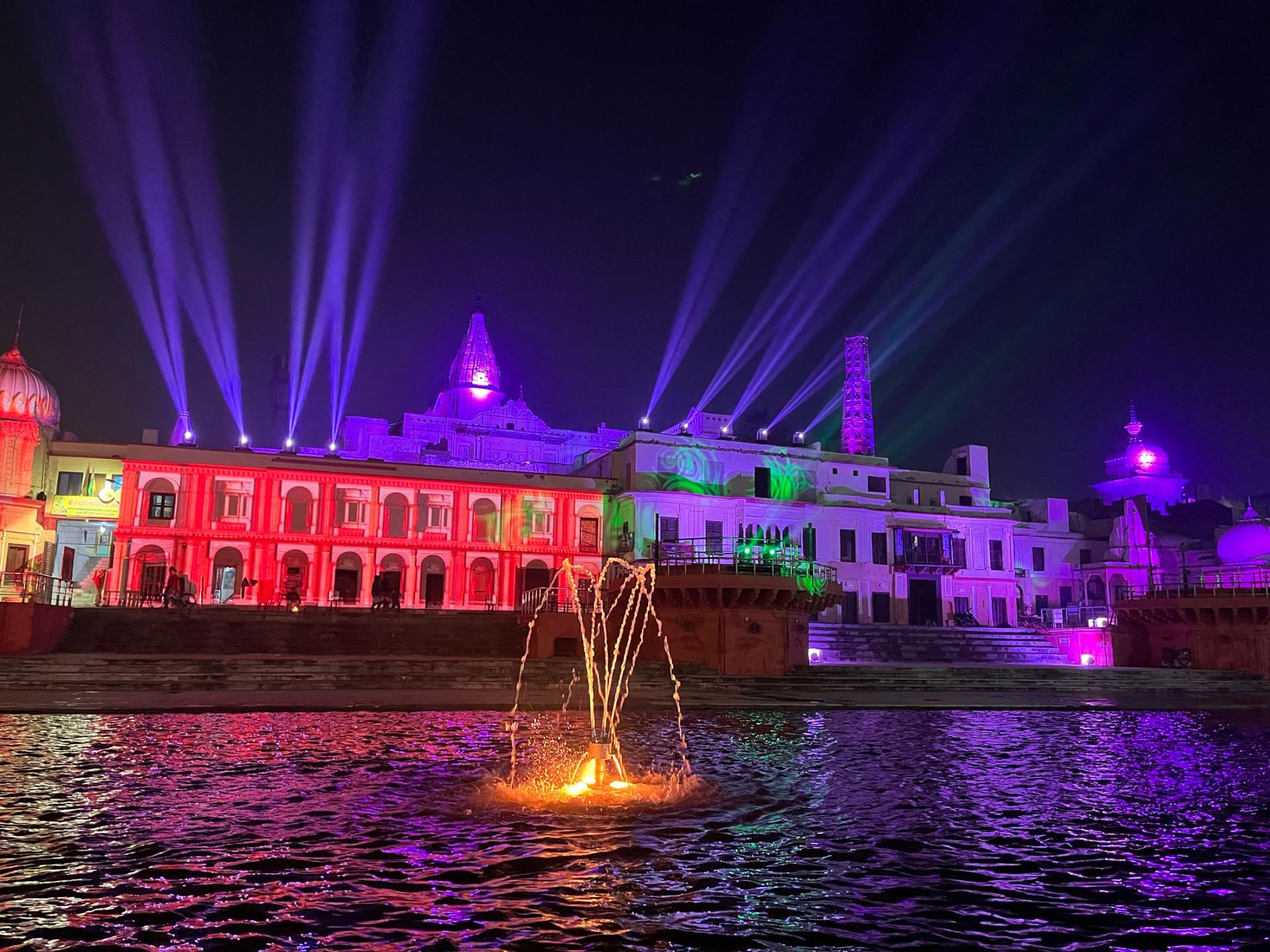  Multicolor laser beams light up the night sky on the banks of the Saryu river in Ayodhya. The town is gearing up to welcome huge crowds of pilgrims seeking blessings at its newest Hindu temple.