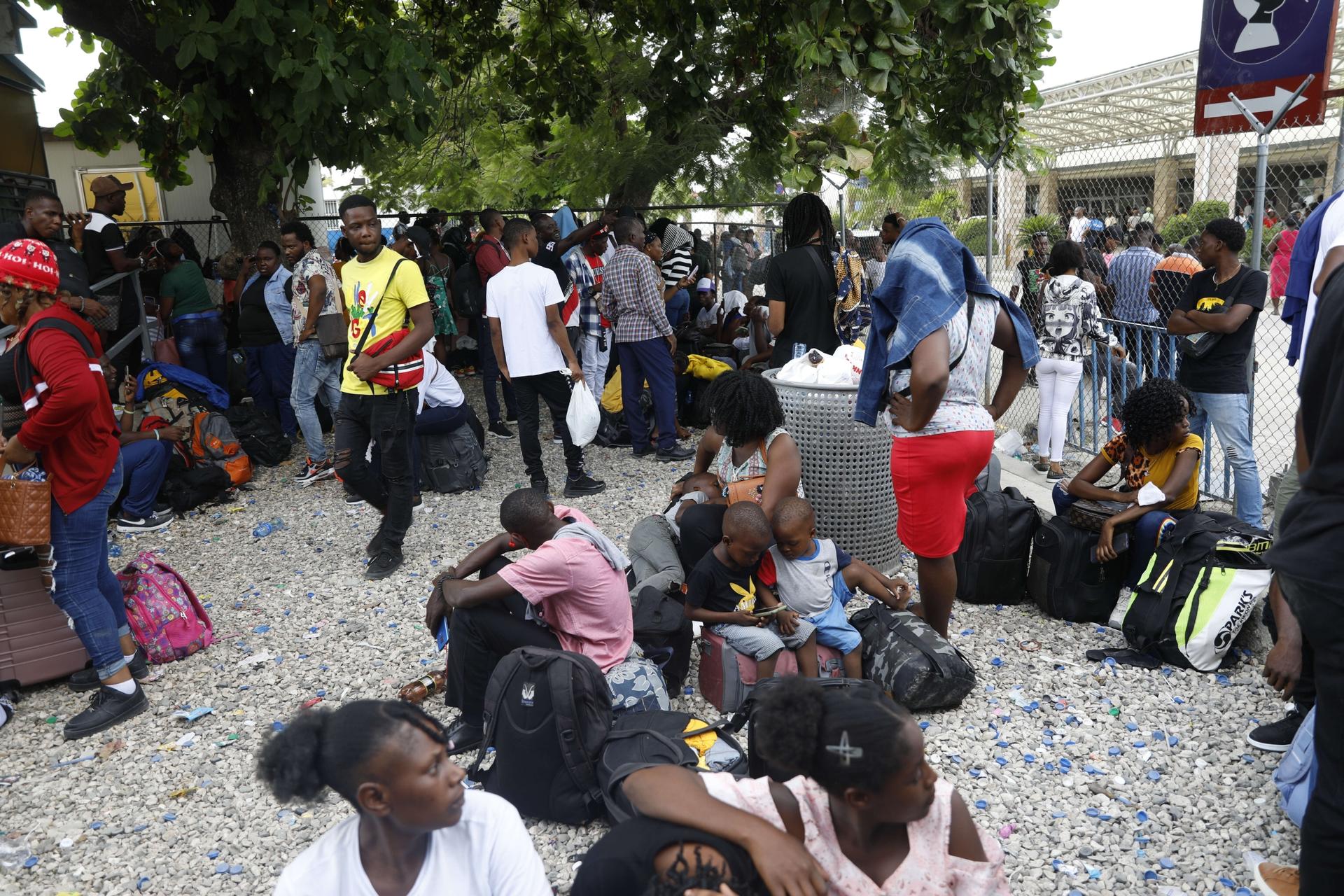 Haitians waiting to board a flight to Nicaragua complain after the government banned all charter flights to the country, at Toussaint Louverture International Airport in Port-au-Prince, Haiti, Oct. 30, 2023.