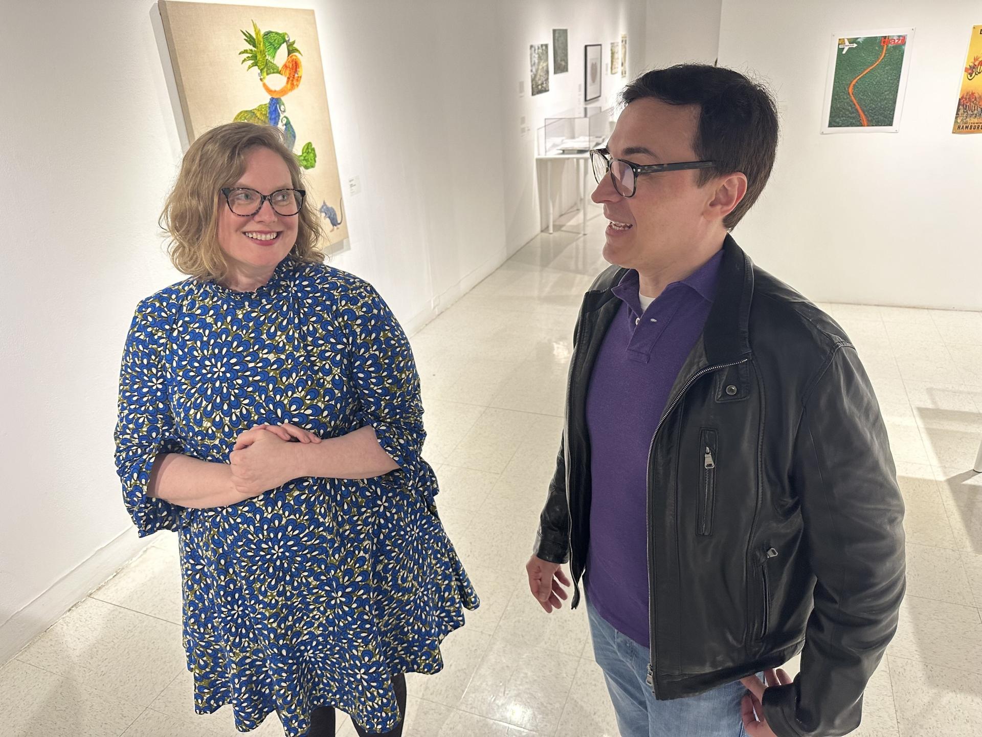 Gillian Sneed and Sergio Allevato stand together at "Imaginary Amazon," an exhibition at the University Art Gallery at San Diego State University.