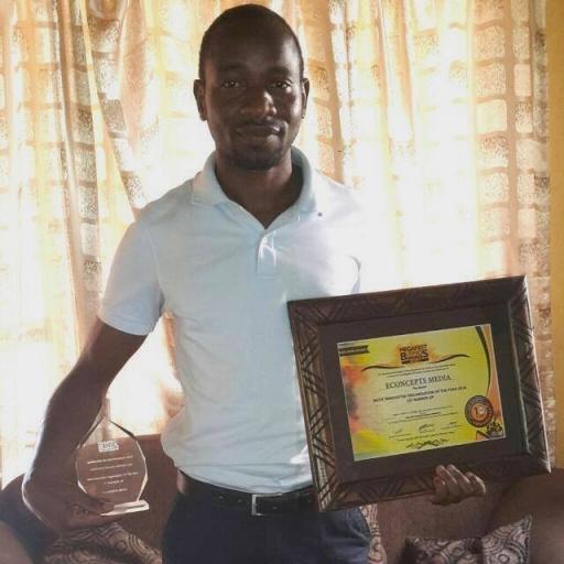Young Zimbabwe man holds certificates of achievement