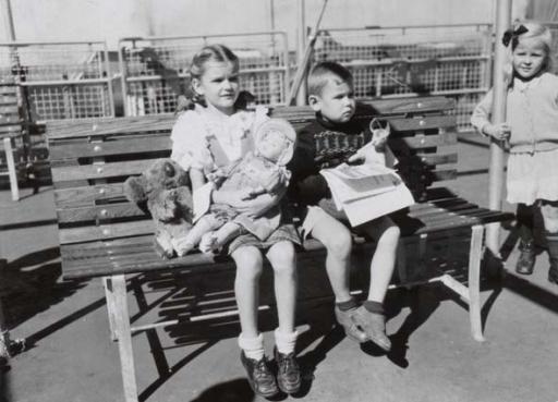 A black and white photo of children