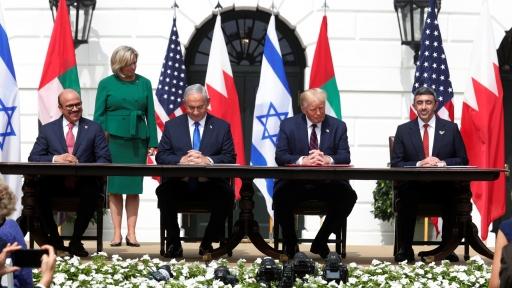 Bahrain's Foreign Minister Abdullatif al-Zayani, Israel's Prime Minister Benjamin Netanyahu, US President Donald Trump and UAE Foreign Minister Abdullah bin Zayed Al Nahyan participate in the signing ceremony of the Abraham Accords in Washington, DC, Sept