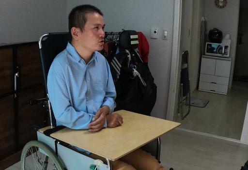 Choo Kyeong-jin lived with hundreds of other people with disabilities in a long-term care center for 15 years and now advocates for deinstitutionalization. 