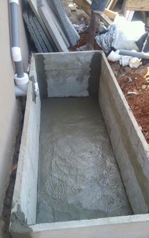 Ernest Fullah's household raised private funds to construct their own toilet.