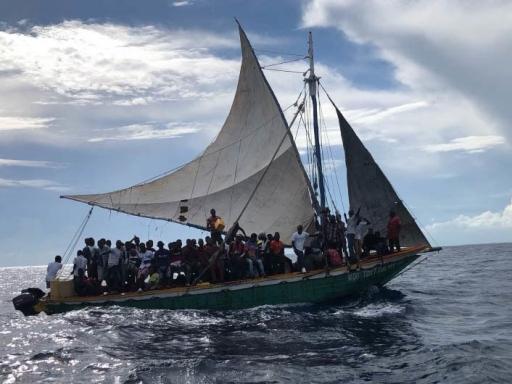 This 35-foot sailing vessel with 103 migrants is interdicted by a Coast Guard Station Miami law enforcement crew approximately 12 miles east of Biscayne Bay, Florida , Sep. 16, 2021. Coast Guard Cutter Diligence's crew repatriated 102 Haitians to Haiti, f