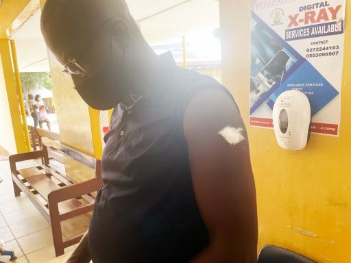 Desmond Amoah receives the COVID-19 vaccine over concerns about the latest omicron variant. 