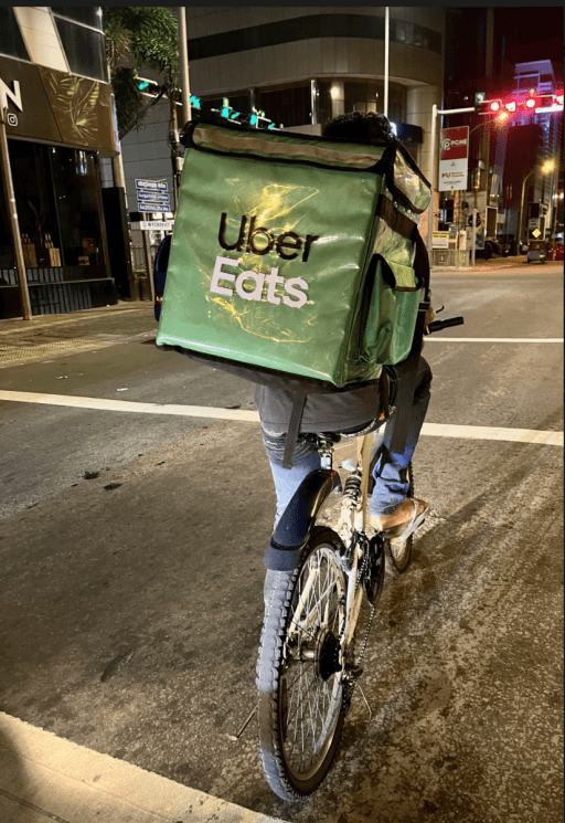 Uber Eats announced in May that it would add bike delivery to its services. A delivery rider is pictured here in Colombo, Sri Lanka, in July.