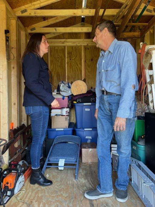 Tulane University linguist Nathalie Dajko and Alces Adams in a storage unit containing Alces’ possessions, Cut Off, Louisiana.