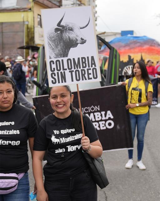 Animal rights activists joined a parade that takes place on the same week as the bullfights in Manizales, Colombia. They carried posters calling for a ban on bullfighting.