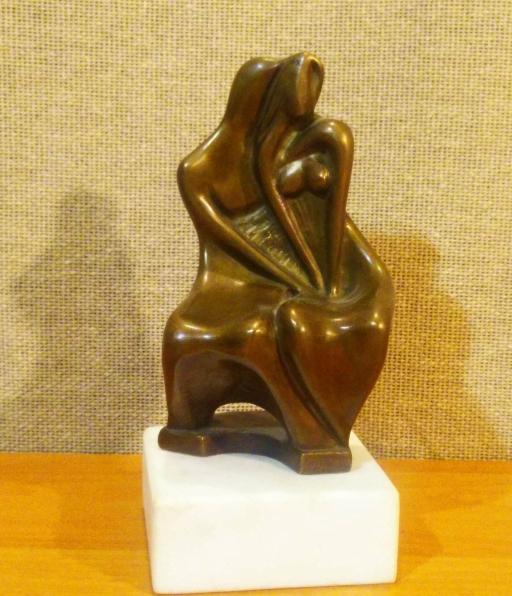 Dedyshyn's sculptures used to express hopeful themes, like this one of a couple in an embrace.
