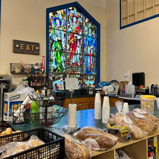 Six days a week, The Lutheran Church of the Good Shepherd provides meals to migrants and others in the community in New York. The operation is run by volunteers partly in this small kitchen area.