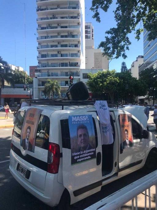 A van is seen on the street with t-shirts of left-wing presidential candidate Sergio Massa.