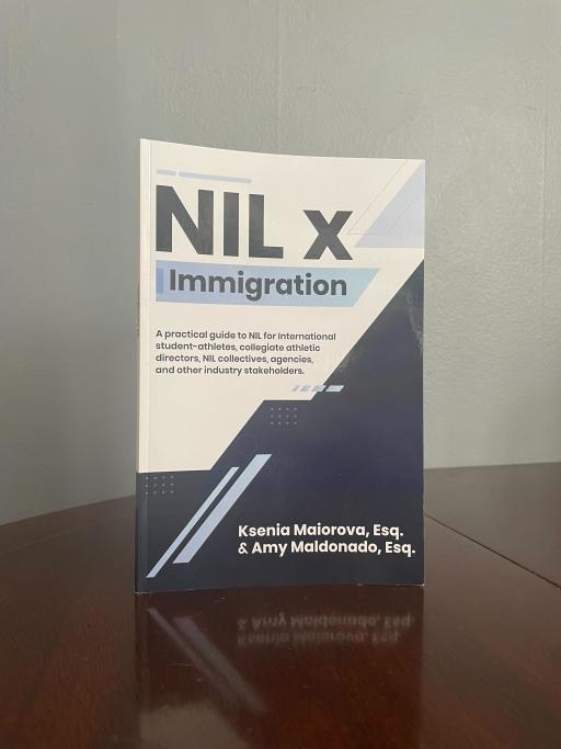 Photo of "NIL x Immigration" guidebook