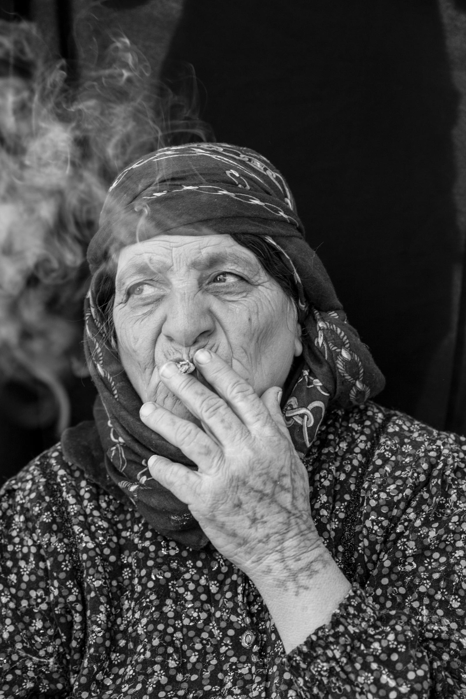 Zubeyda Ali, 60, who fled Kobani with her whole family, including ten married children and 25 grandchildren, was tattooed at the age of 13. She has a large tattoo on her left hand and some small inverted 