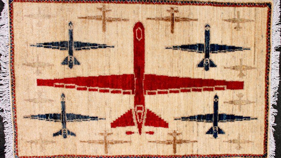Reaper drones appear on this rug which was hand-woven in Pakistan.