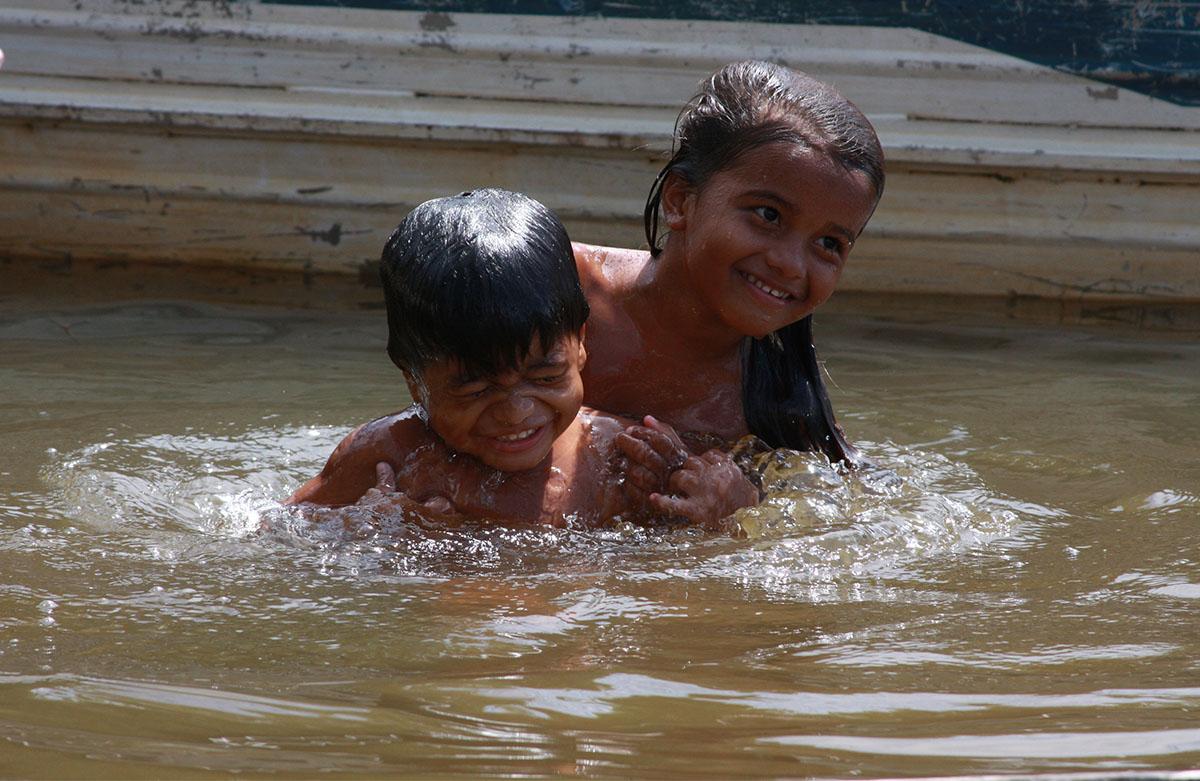 children in river