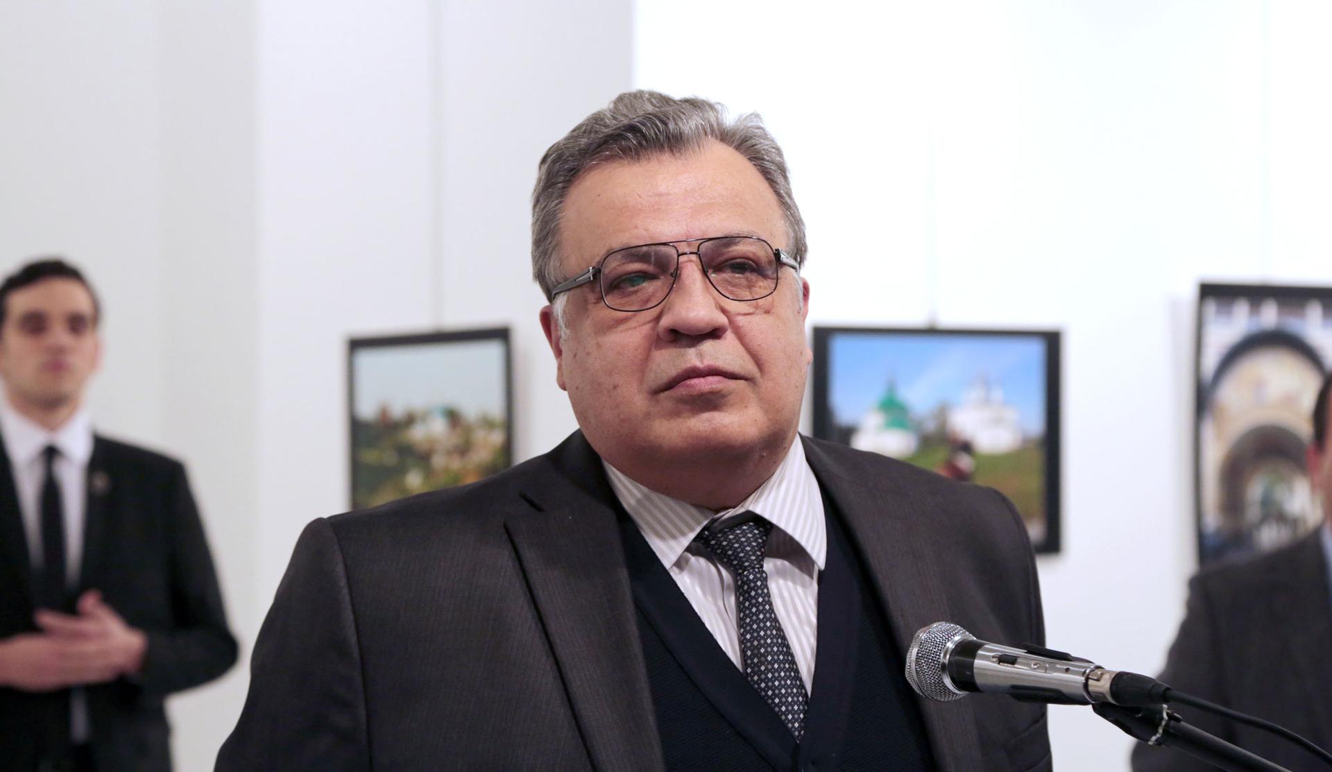 Andrei Karlov, the Russian Ambassador to Turkey, pauses during a speech at a photo exhibition in Ankara on Dec. 19, 2016, moments before a gunman opened fire on him.
