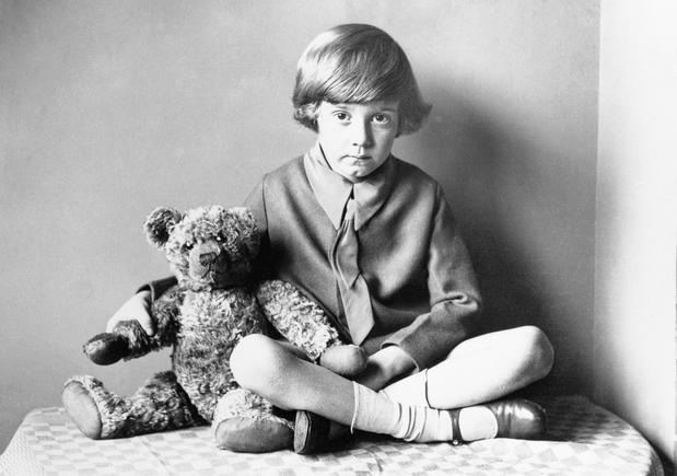 Christopher Robin with the teddy bear that inspired Winnie the Pooh (c. 1925) (IMAGE: BETTMANN/CORBIS)