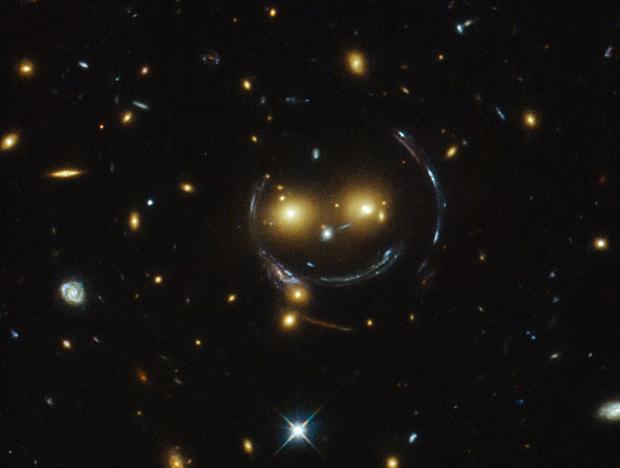 Hubble telescope finds a smiley face in space