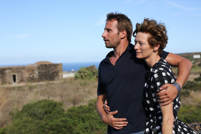 Matthias Schoenaerts and Tilda Swinton as a vacationing couple in 
