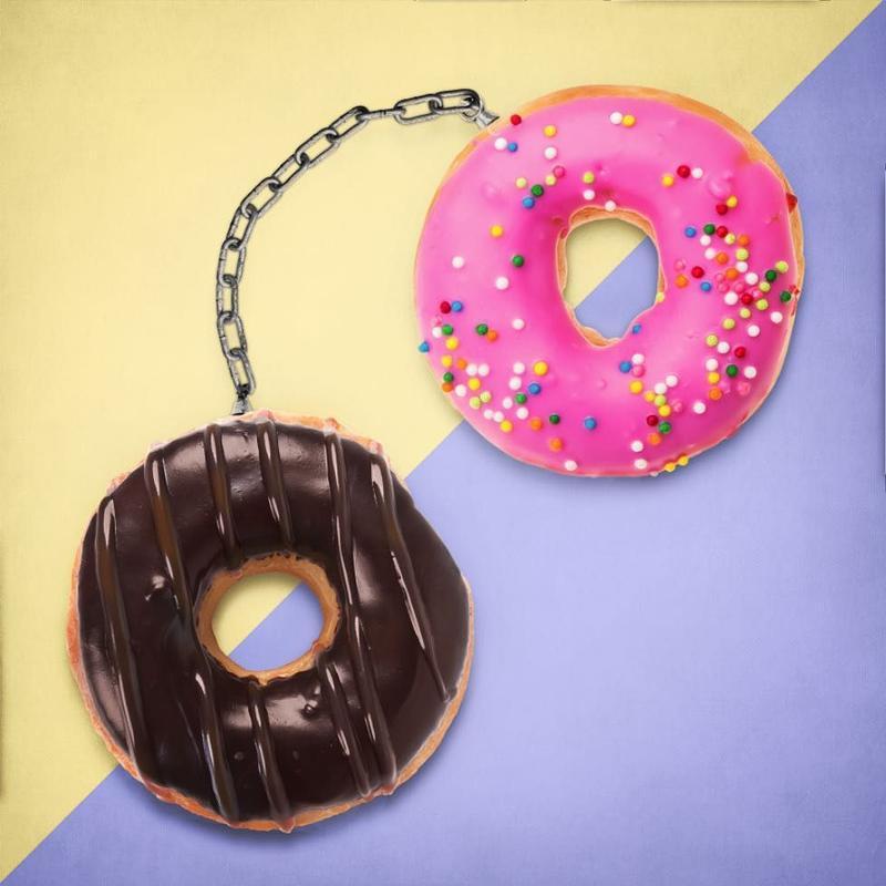 Doughnuts make handcuffs in this pop art mash up by Paul Fuentes