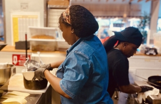 Ginette Derelus is a cook at Manjay Restaurant at The Citadel near Little Haiti, Miami. Duolingo partnered with Haitian restaurants to promote the new language course. Derelus, a Haitian Bahamian, says she and her Haitian husband teach their three childre